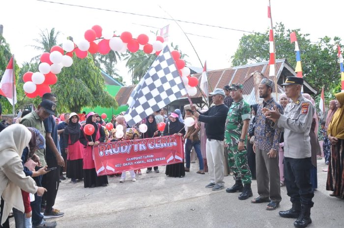 Ribuan Pelajar Kecamatan Darul Kamal Ikut Meriahkan Karnaval Perayaan HUT ke-80 RI