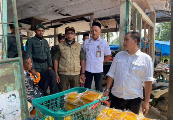 Satpol PP dan WH Aceh Besar Tindaklanjut Laporan Warga di Pasar Sibreh